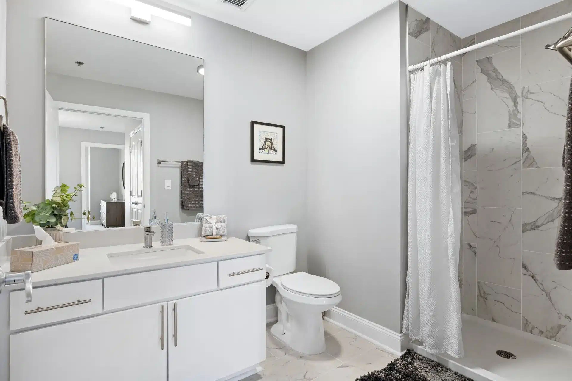Modern apartment bathroom renovation at Encore multifamily property