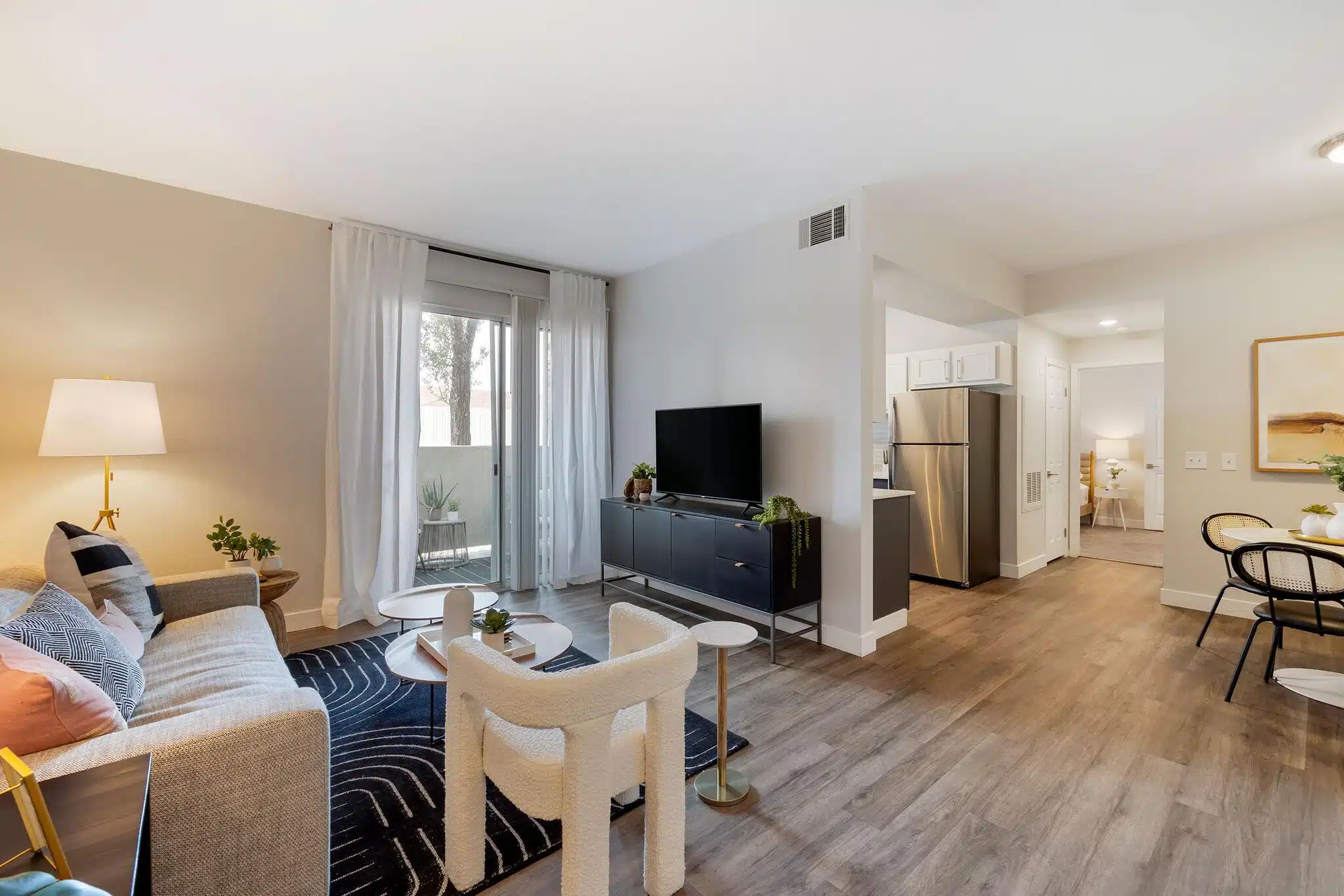 Open concept apartment living and kitchen renovation with contemporary multifamily design in Las Vegas NV
