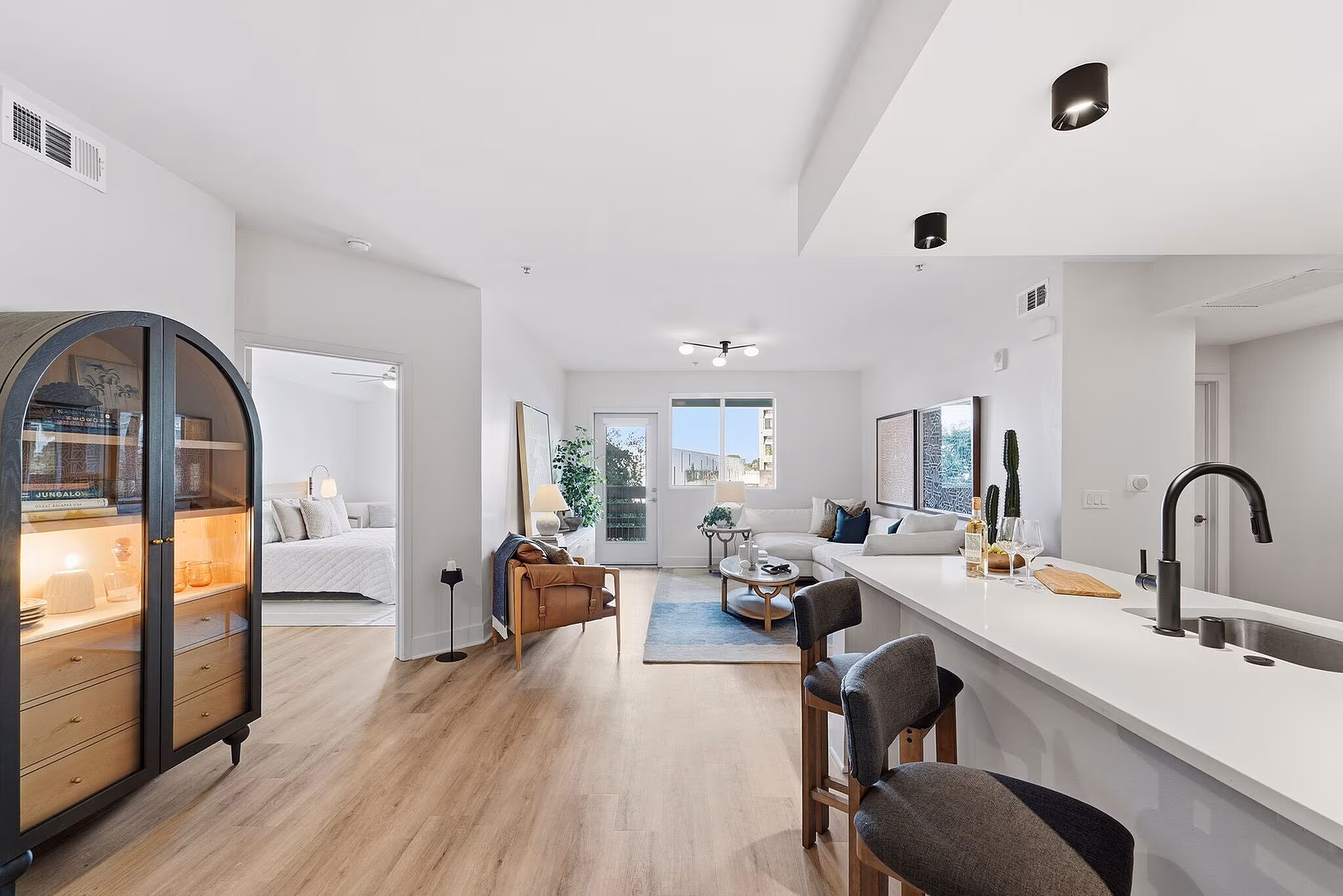 Modern open-concept apartment interior renovation with upgraded flooring in Playa Vista, CA