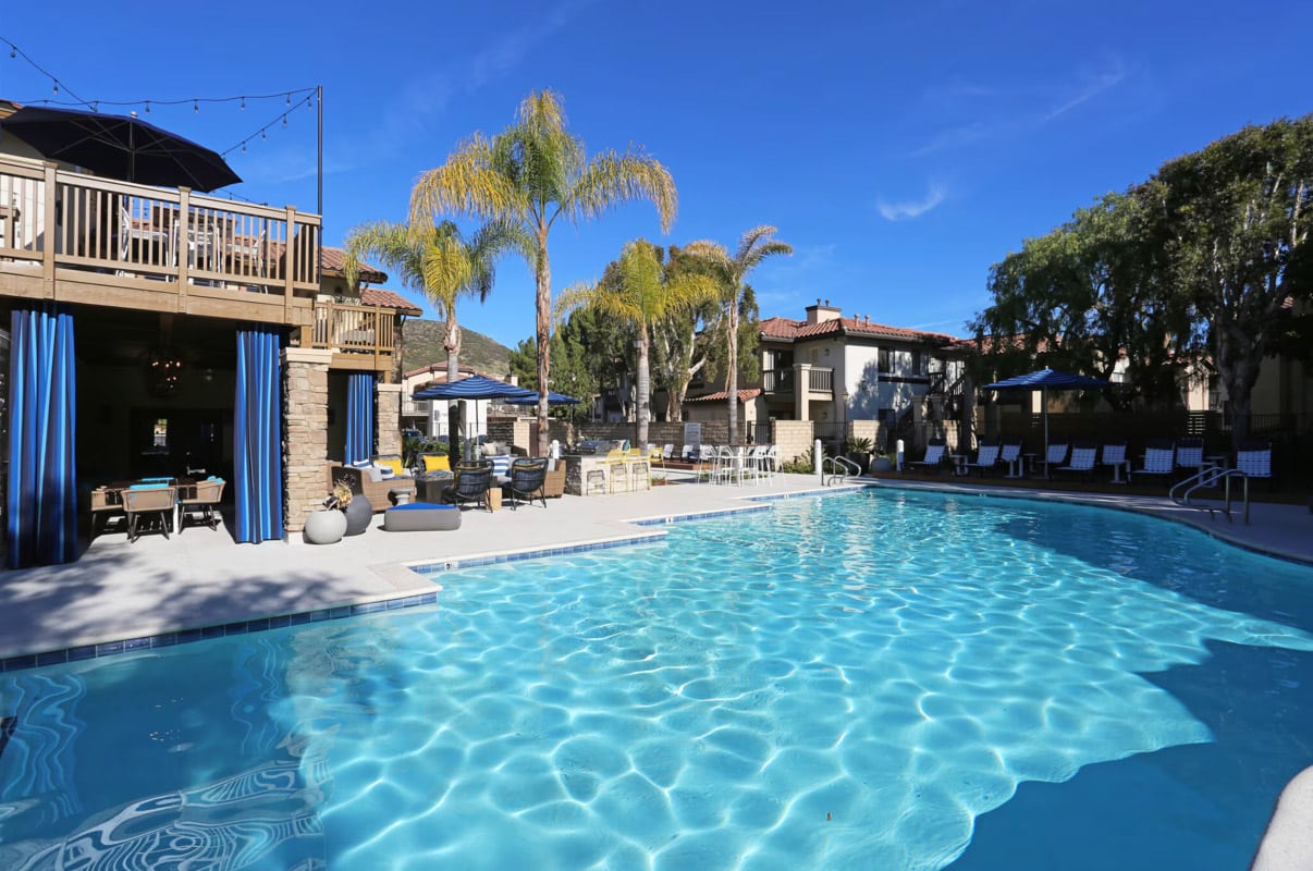 Upgraded apartment community pool area with luxury outdoor amenities in Thousand Oaks, CA