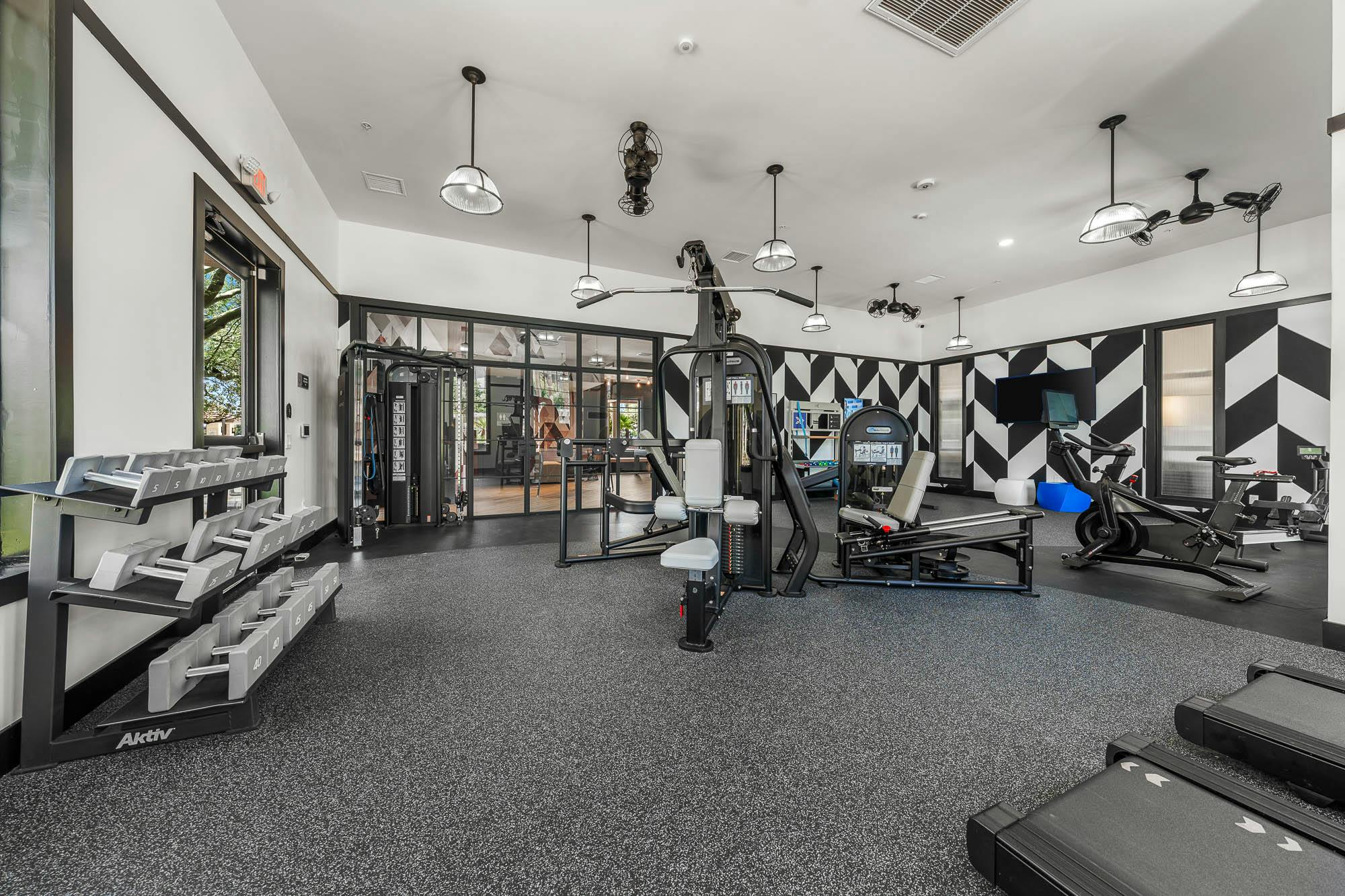 Modern apartment fitness center renovation with upgraded workout equipment in Gilbert, AZ