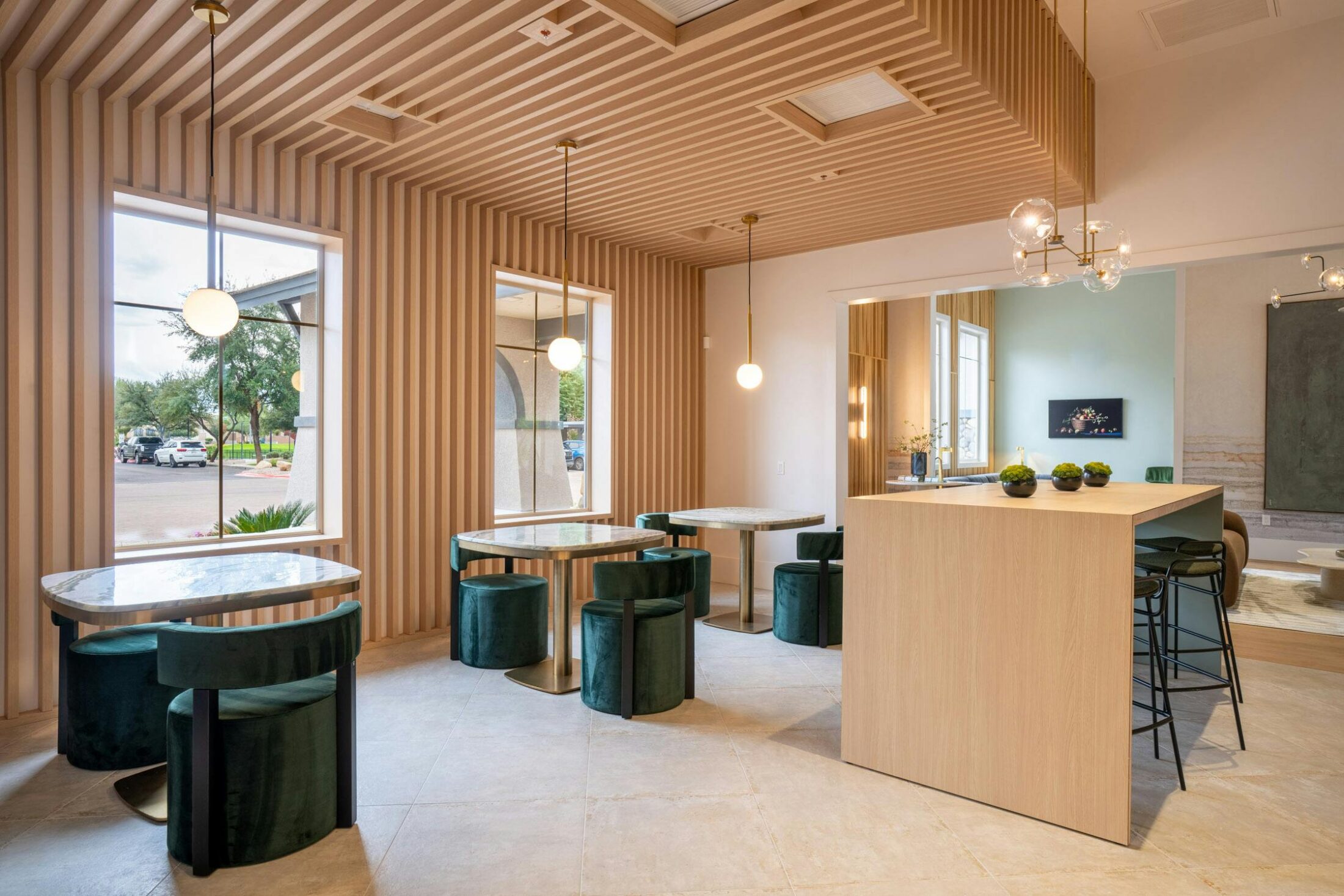 Renovated multifamily community lounge with upgraded seating and modern finishes in Gilbert, AZ