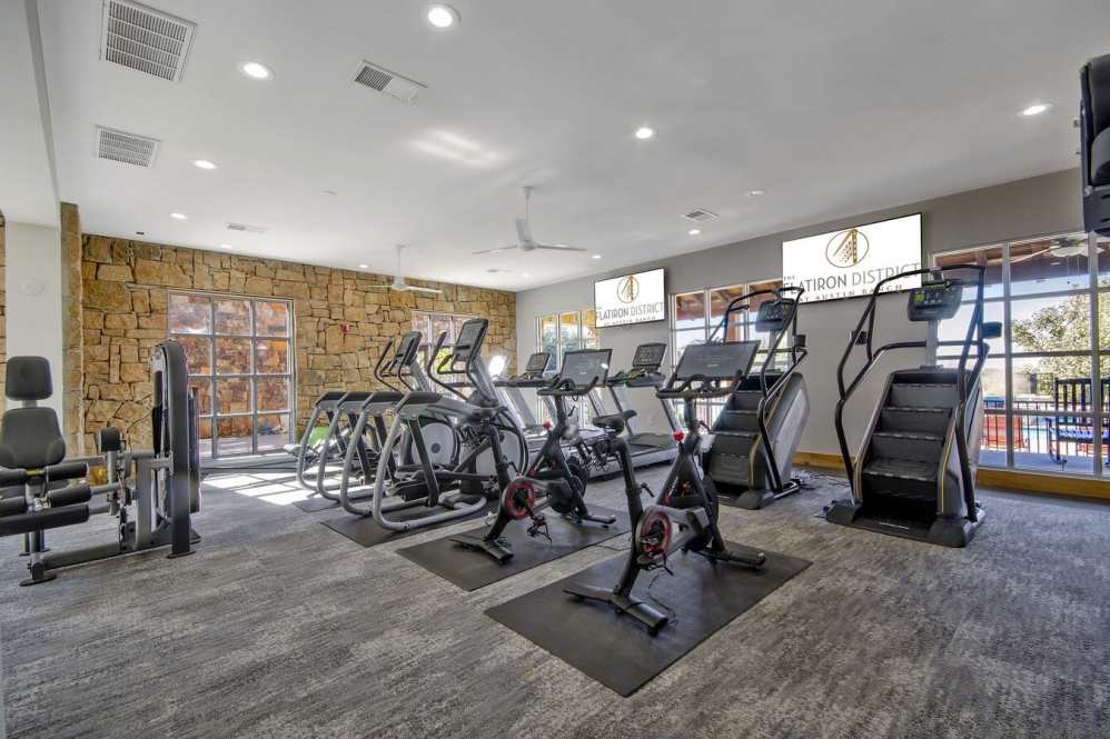 Modern fitness center renovation at Flatiron District multifamily community