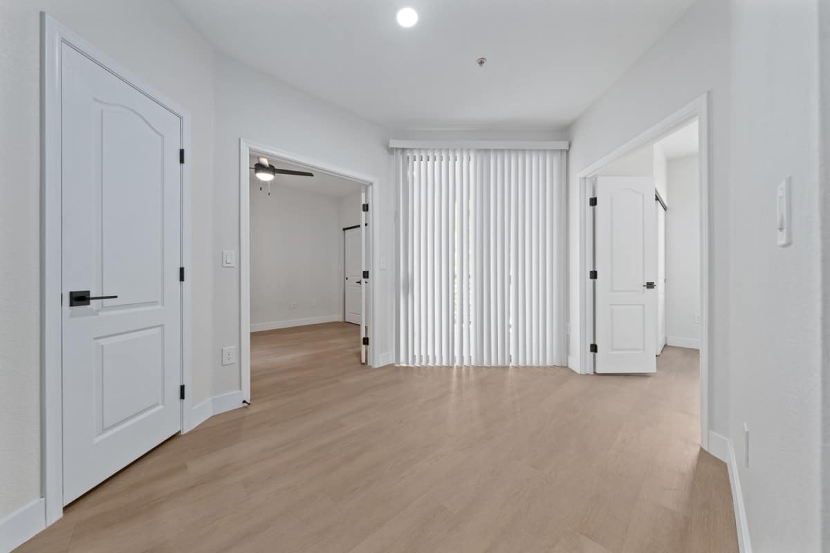 Modern multifamily apartment interior with upgraded flooring and contemporary design in Phoenix, AZ