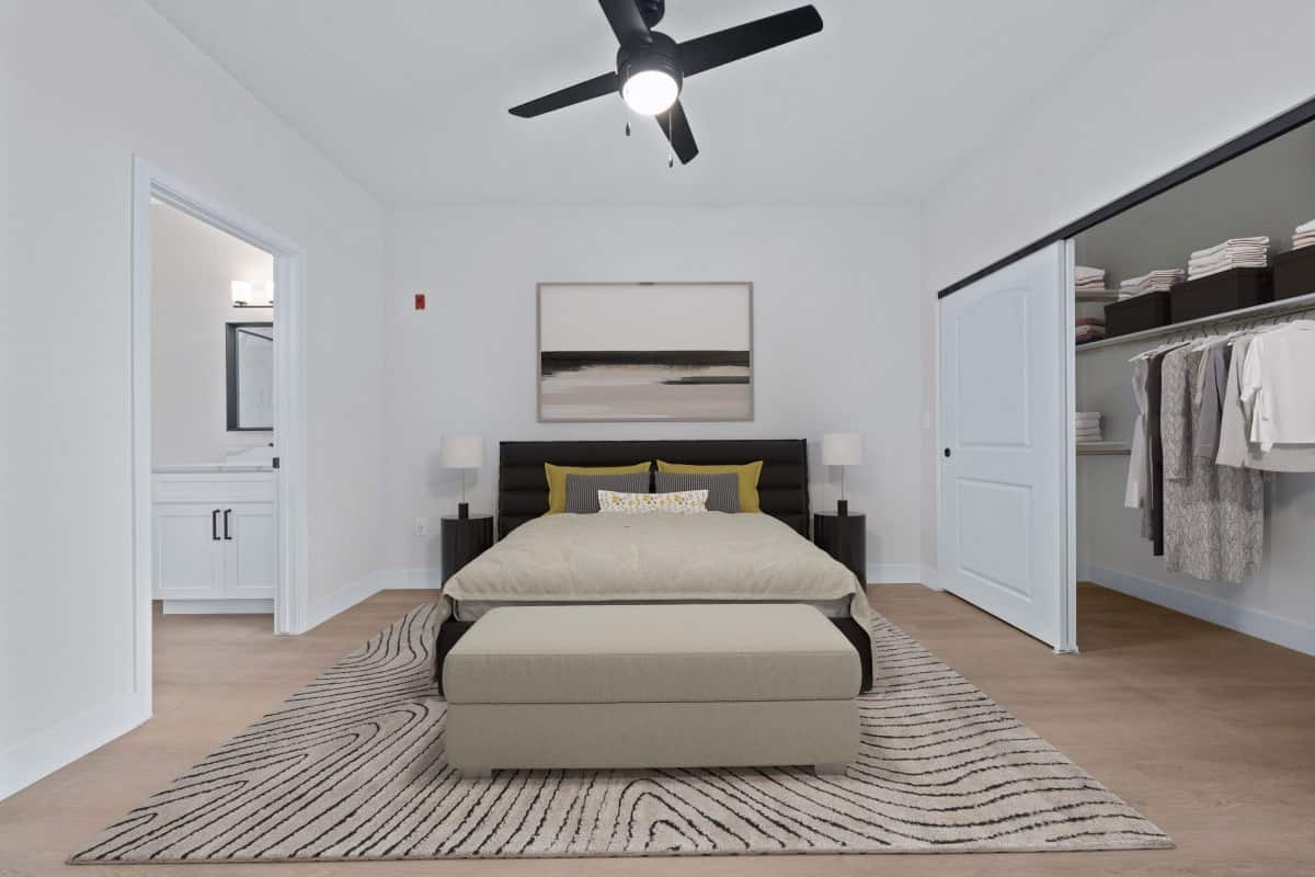 Renovated apartment bedroom with modern finishes and walk-in closet in Phoenix, AZ